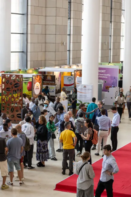 Visitors meeting exhibitors on the AFCA trade floor